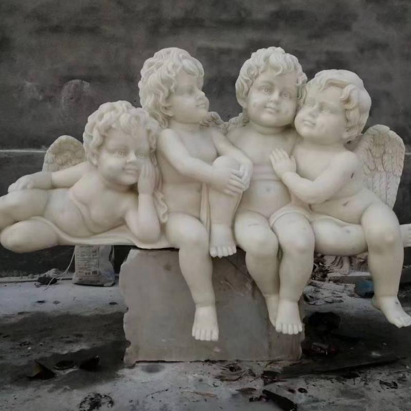 Estátua de mármore do anjo da criança
