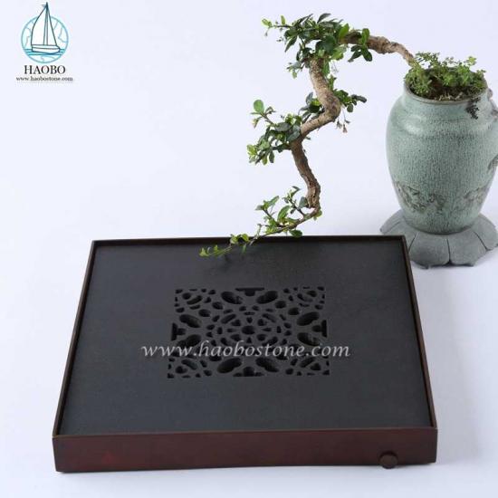 Bandeja de chá de pedra quadrada com design oco de granito preto da China
